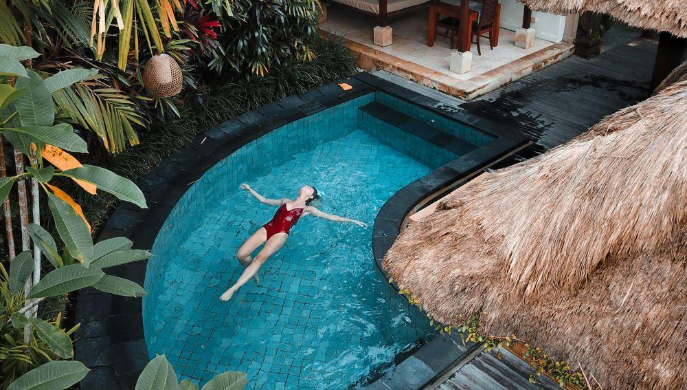 Alt Tag: A Women Relaxing on the Swimming Pool Photo Credits By: Michael Block